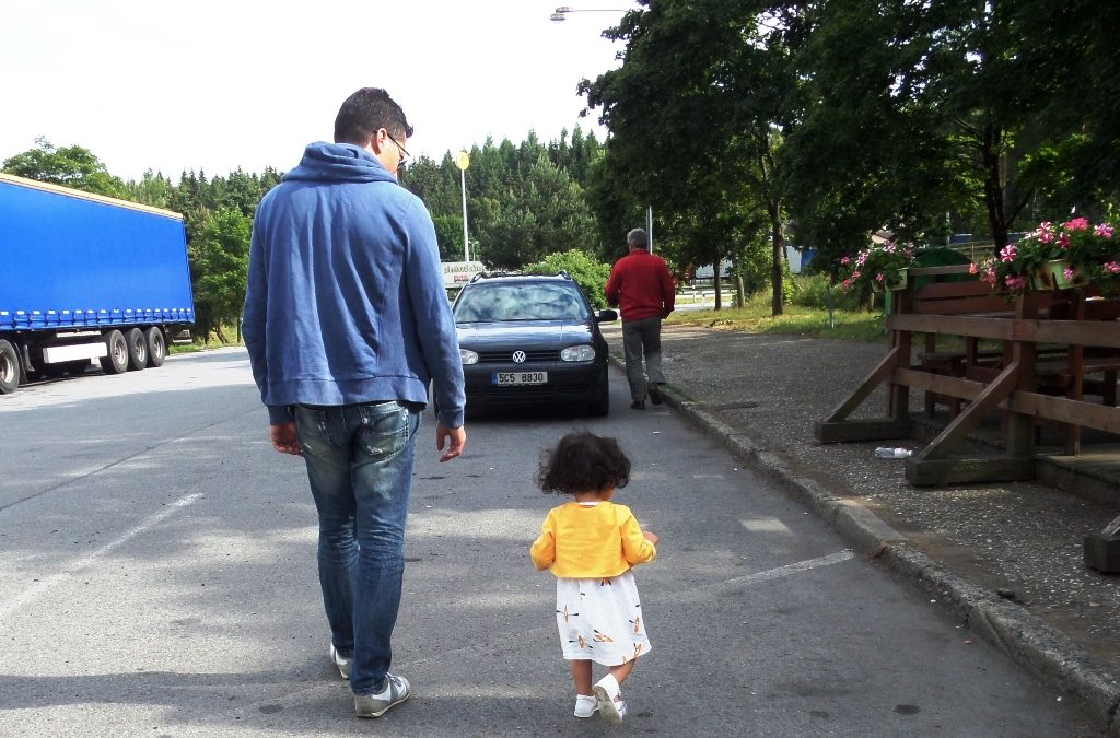 Lara and dad walking in Slovakia