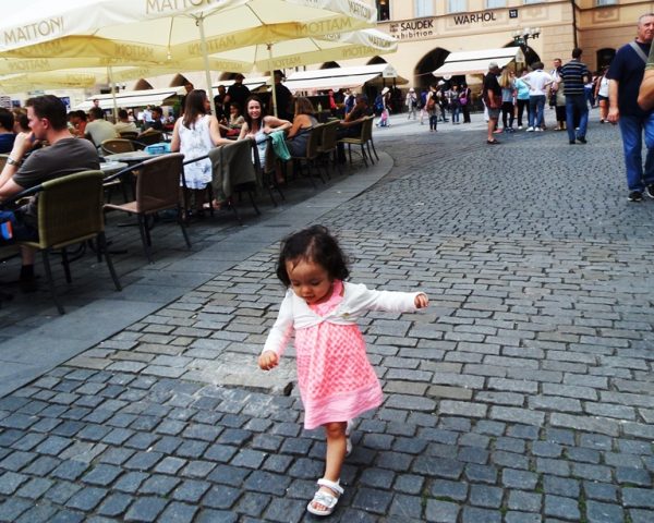Lara strolling on the old town square