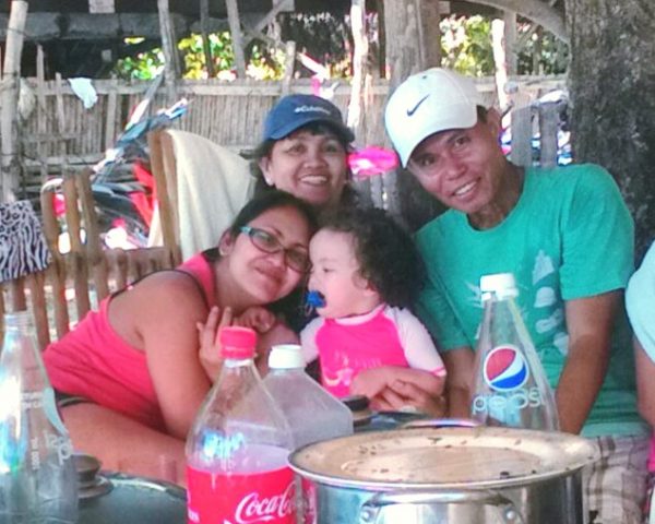 Lara with mom, lola and lolo at Lara Beach Bohol