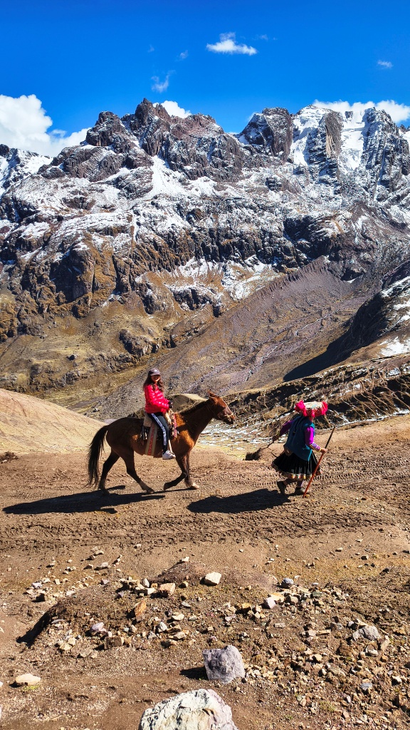 Lara the Explorer at Vinicunca